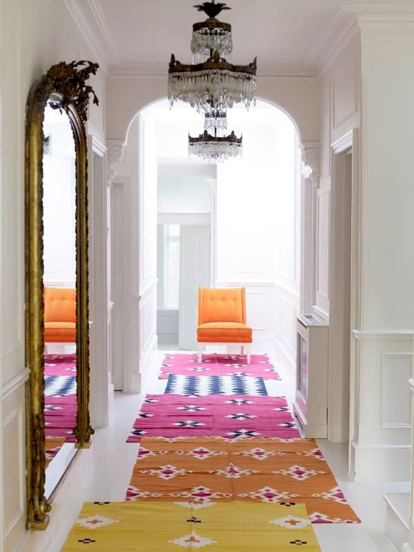 Layering rugs - Photo by Sarah Kaye - hallway design ideas - colorful rug ideas - hallway decorating ideas