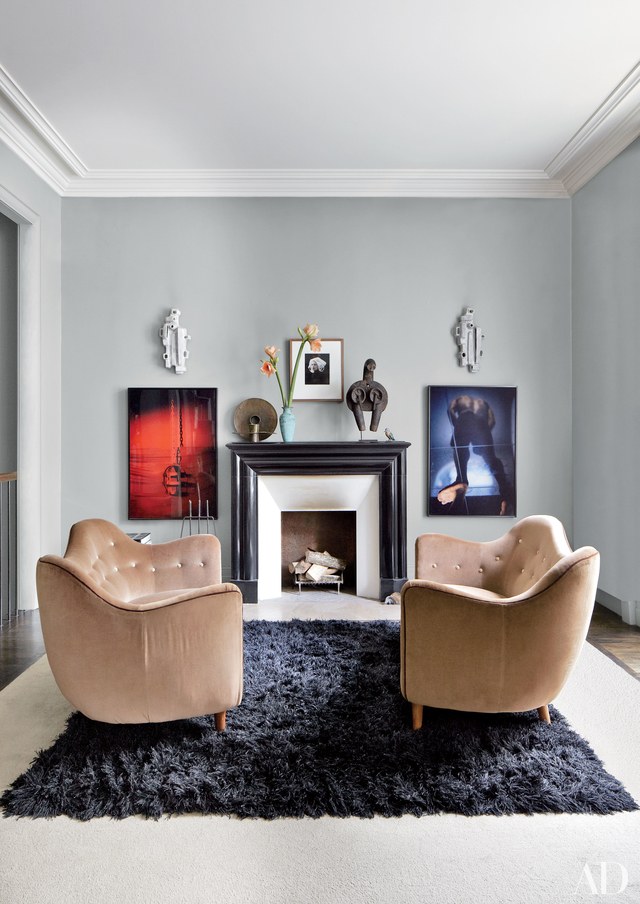 layering rugs - Stefano Pilati's Paris Apartment. Photo by Bjorn Wallander via AD - living room design ideas