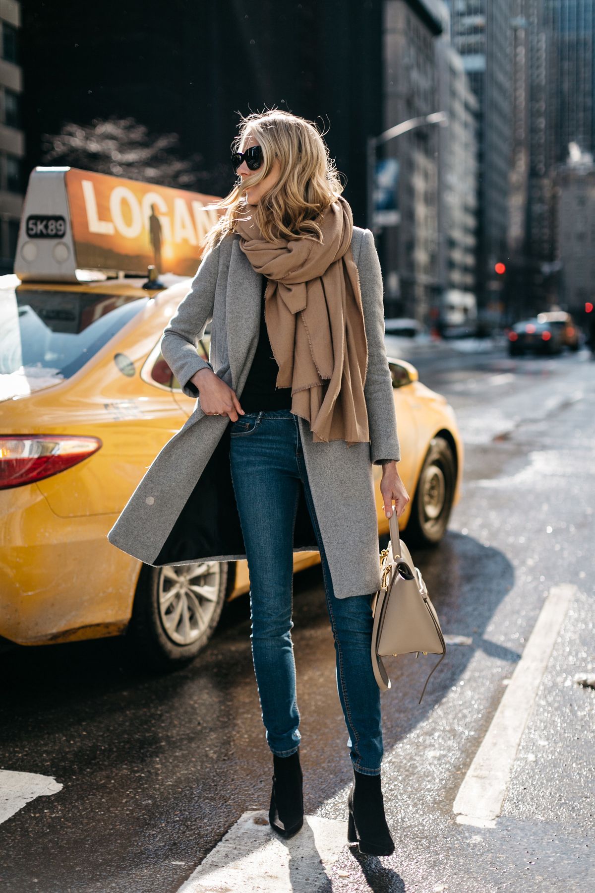 How to Dress to Impress When Traveling the World - Fashion Jackson - blanket scarves - blanket scarf - travel outfit ideas - fashionable travel tips