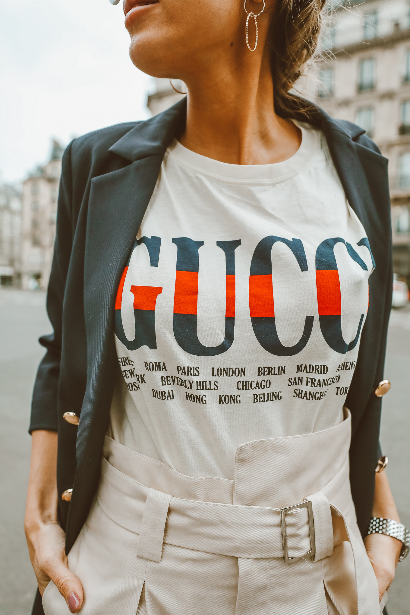 How to Dress to Impress When Traveling the World - Gucci Tee - Source Hello Fashion Blog - graphic tees - slogan tees - travel outfit ideas - how to look stylish while traveling - travel packing tips