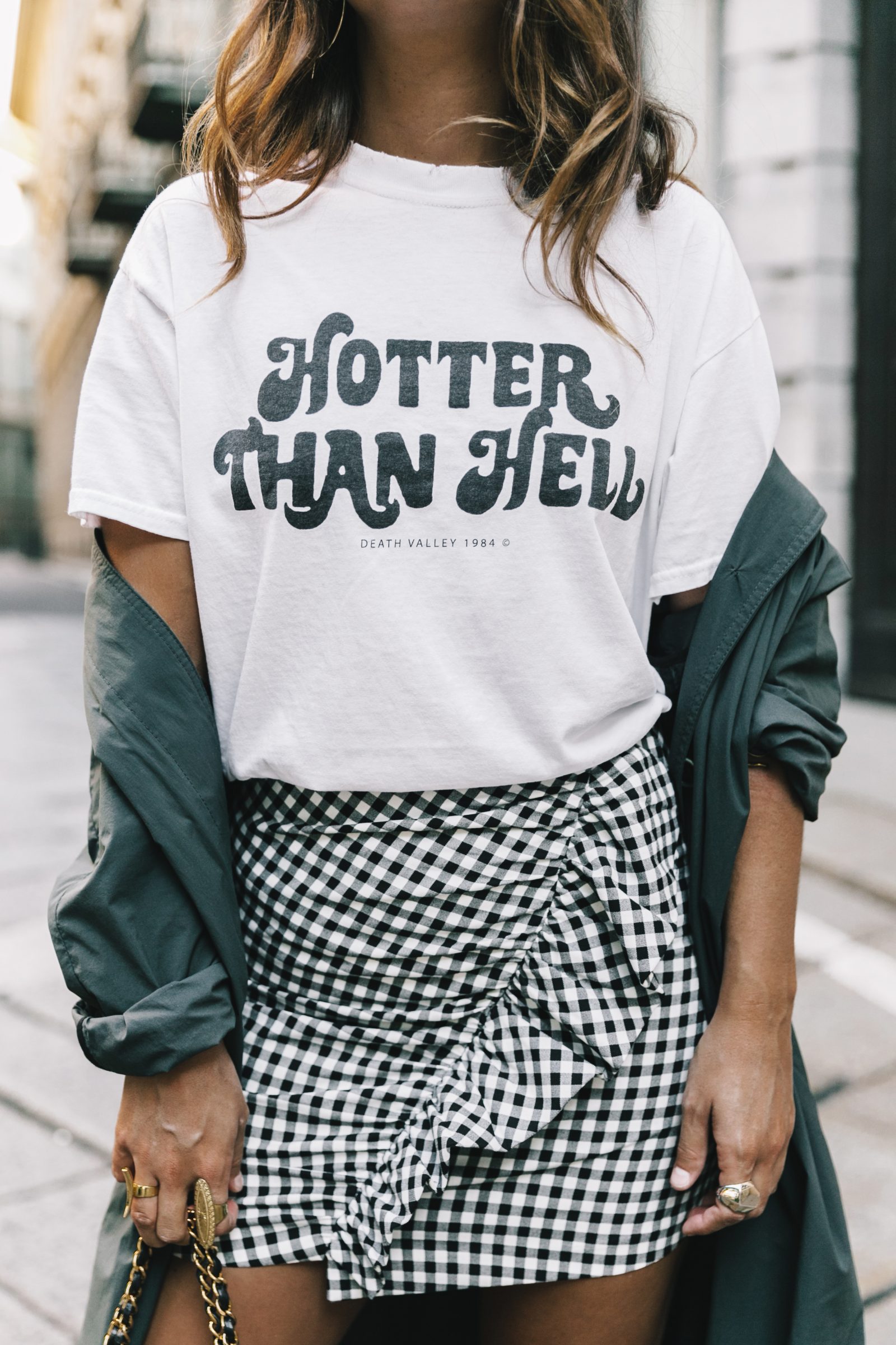 how to dress to impress when traveling the world - MFW-Milan_Fashion_Week_SS17-Street_Style-Outfits-Collage_Vintage-Bottega_Veneta-Bluemarine-Jil_Sander - milan fashion week ss17 - travel outfit ideas - patterned skirts - travel packing tips - hotter than hell - slogan t-shirts - slogan tees - hotter than hell t-shirt