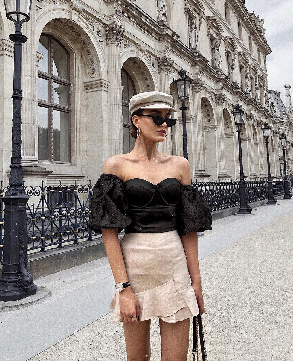 How to dress to impress while traveling the world - sindi-arifi-falda-lino-asimetrica-Source Instagram @sindiarifi - travel outfit ideas - travel packing tips - looking fashionable while traveling