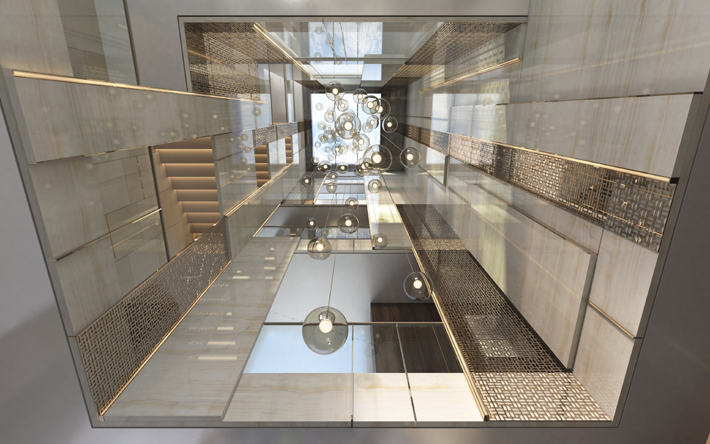 Architectural view looking up at a grand pendant chandelier and luxurious paneled walls in a villa in Mumbai by HBA Residential