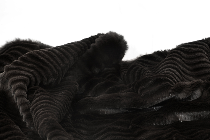 laser cut rabbit black throw by koket - top new year's resolutions