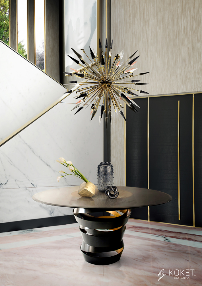 luxurious foyer with black and gold intuition table and outburst chandelier by koket - top new year's resolutions