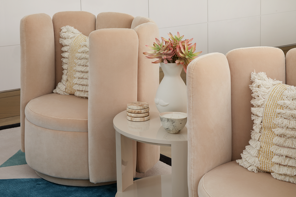light pink chairs in a Playful Interior by Elycion