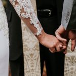 habits of the happiest couples - bride and groom holding hands -happy marriages