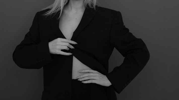 lose weight after 40 black and white photo of a woman in a business suit