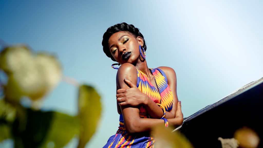 healthy new year resolutions beautiful woman hugging herself photo by De'Andre Bush