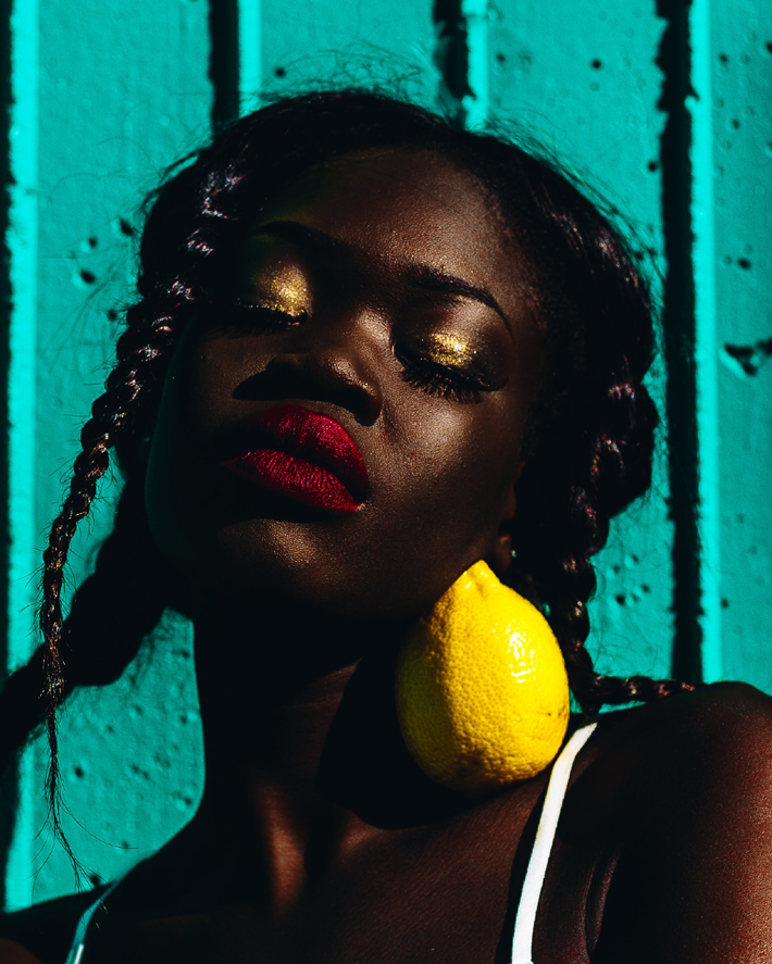 The forever classic Red Lip takes on a metallic glam. Photo by Oladimeji Odunsi.