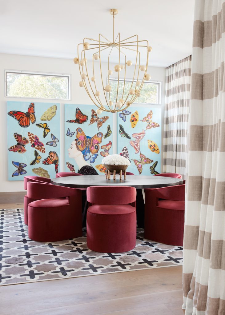 luxury dining room with butterfly wallpaper