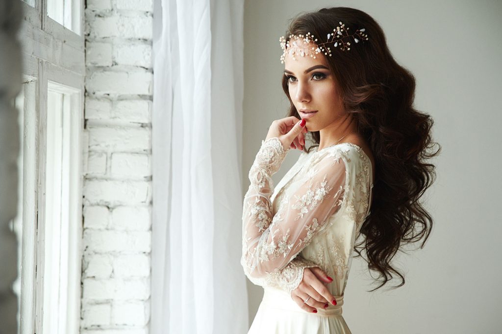 curly wedding hair with tiara
