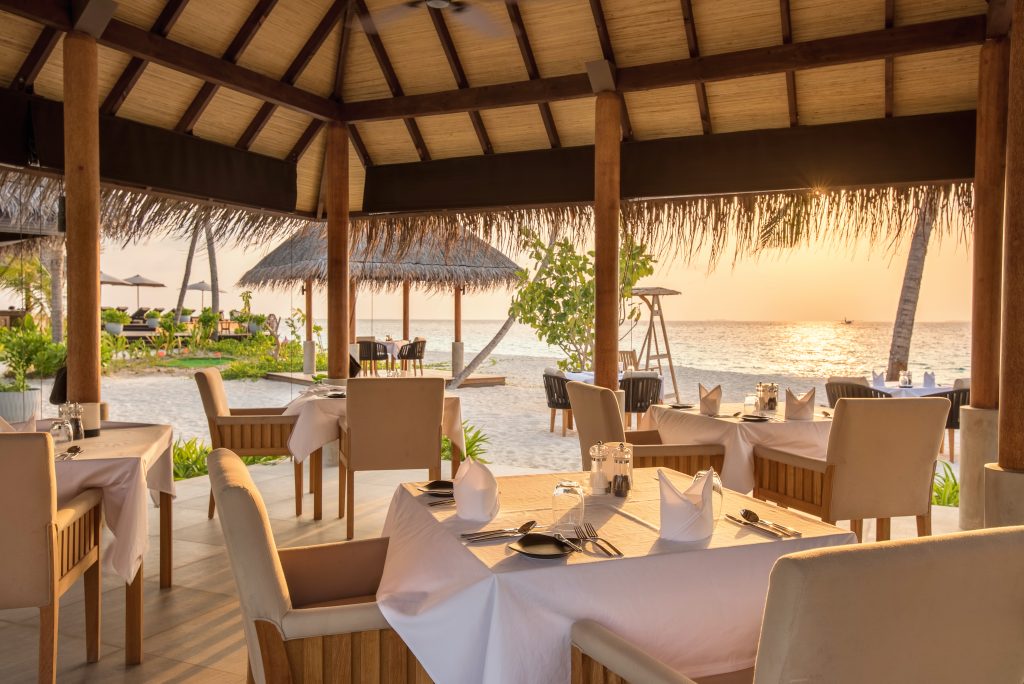 sunset view from raakani restaurant maldvives beach dining