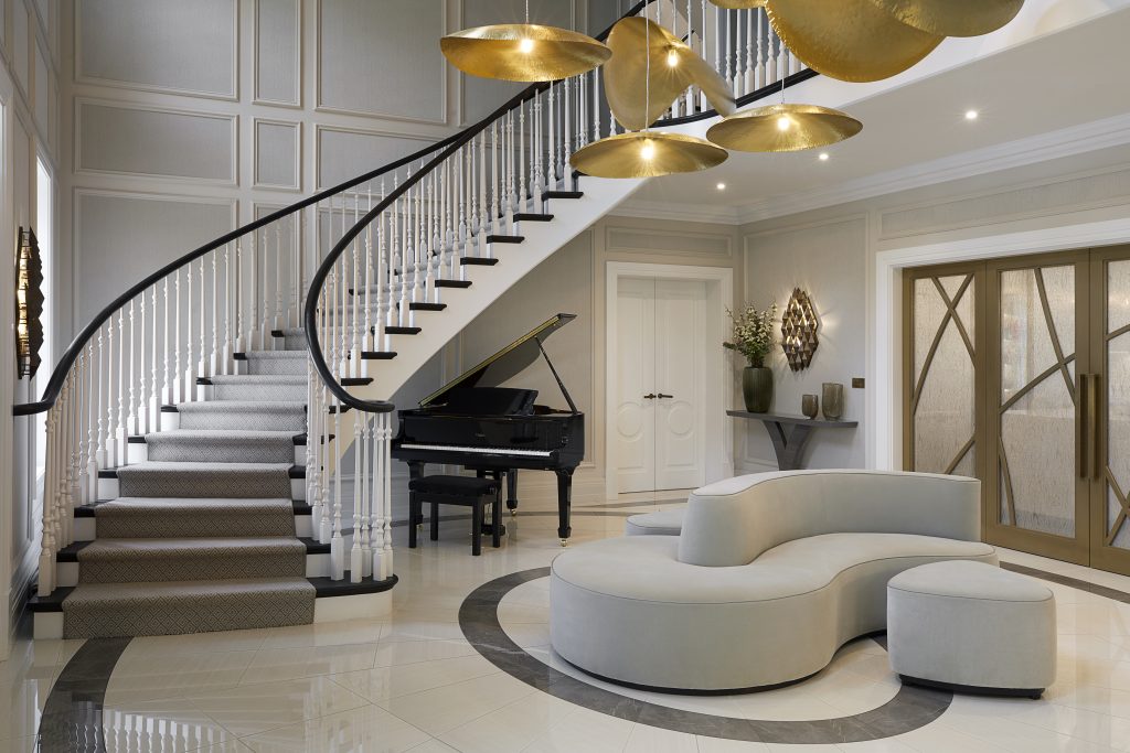 luxury foyer Interior design by Laura Hammett cream and gold