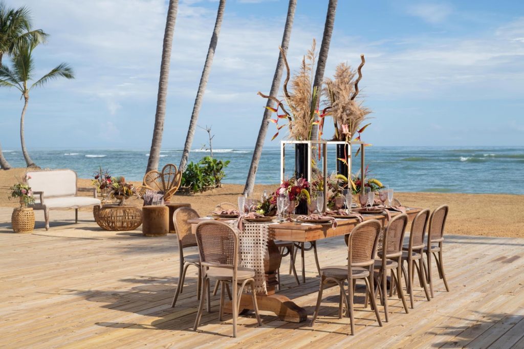 intimate wedding dinner set up on a beach