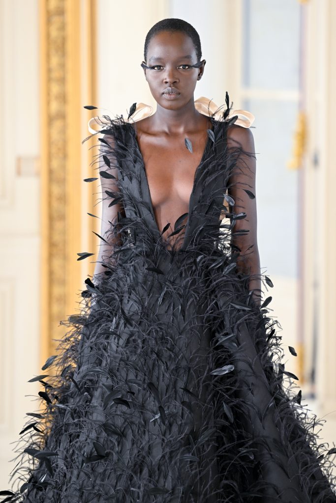 For Non-Editorial use please seek approval from Fashion House) A model walks the runway during the Valentino Haute Couture Spring/Summer 2022 show as part of Paris Fashion Week on January 26, 2022 in Paris, France. (Photo by Peter White/Getty Images)