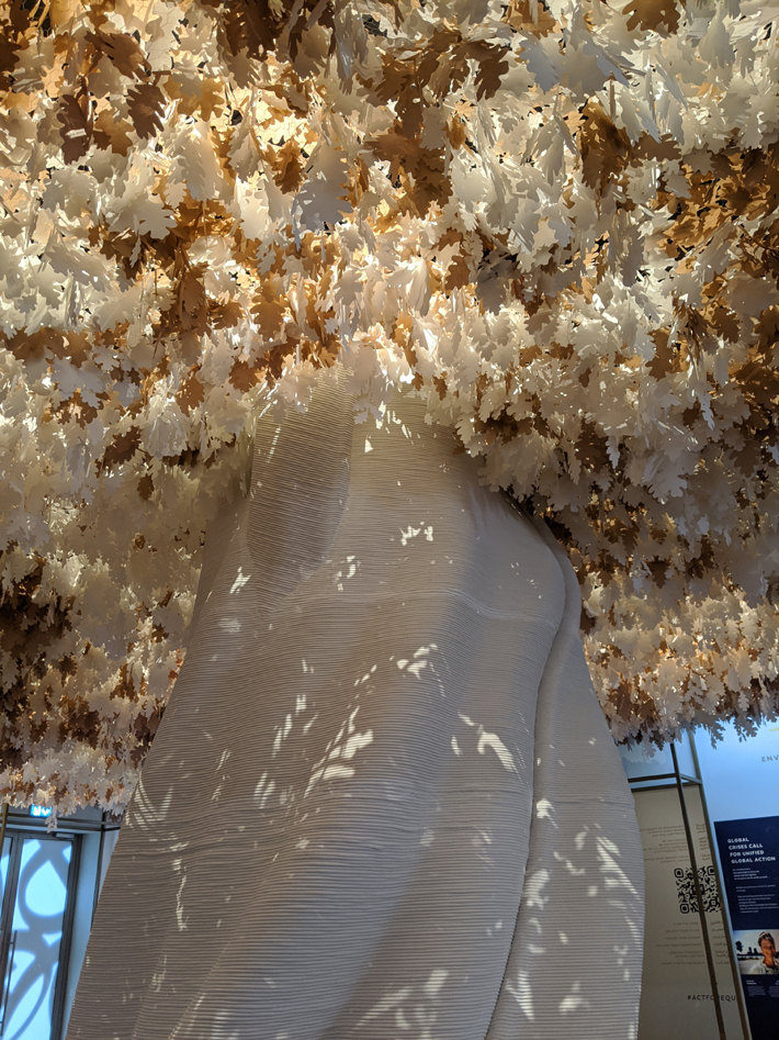 A 3D-printed concrete tree, weighing 3.5 tons at the center of the Solutions room in the Women's Pavilion
