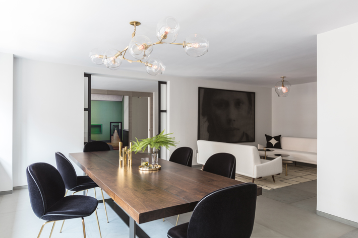 dining room and living room in a five apartment combo project designed by Glikman Schlesinger (Photos by Lauren Coleman)