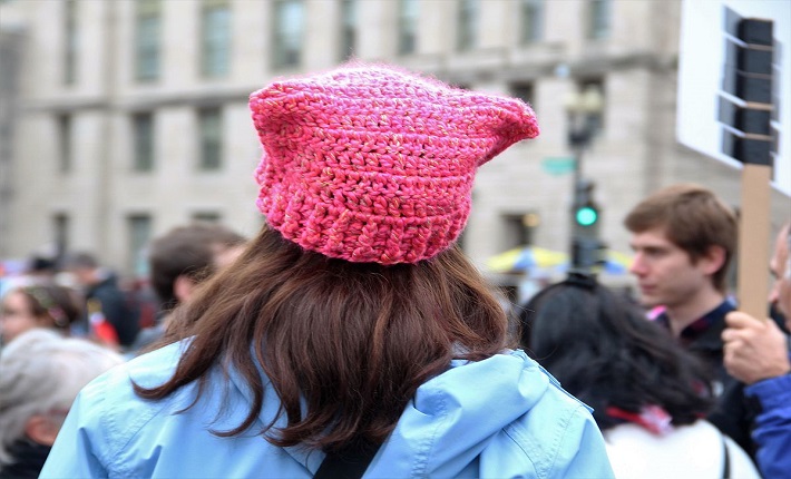 woman wearing a pink knit Pussyhat at the 2017 Women's March on Washington (Photo by Thirty Two / Wikimedia)