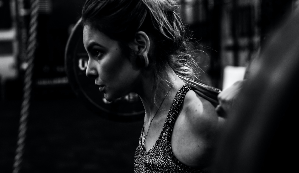 Ways to Pump Your Fitness Level in 2023 - photo of a woman working out black and white by sushil ghimire unsplash