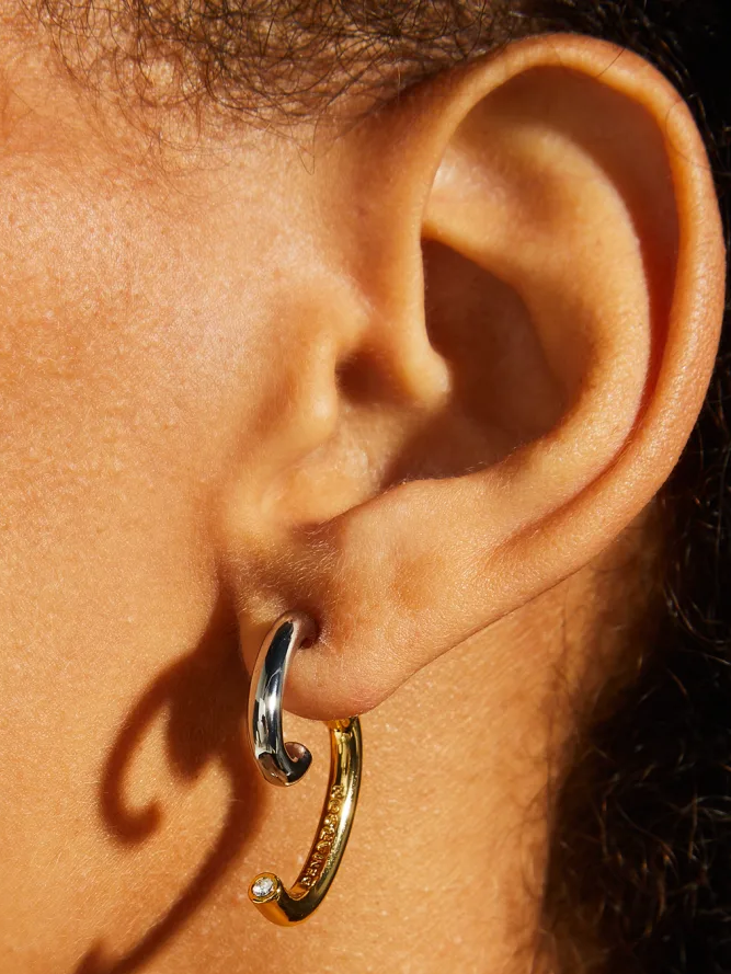 2024 Jewelry Trends: Silver and gold earrrings