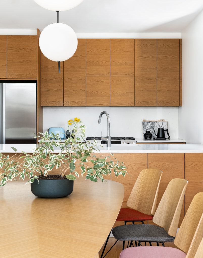 modern kitchen design with oak cabinets and white counter tops