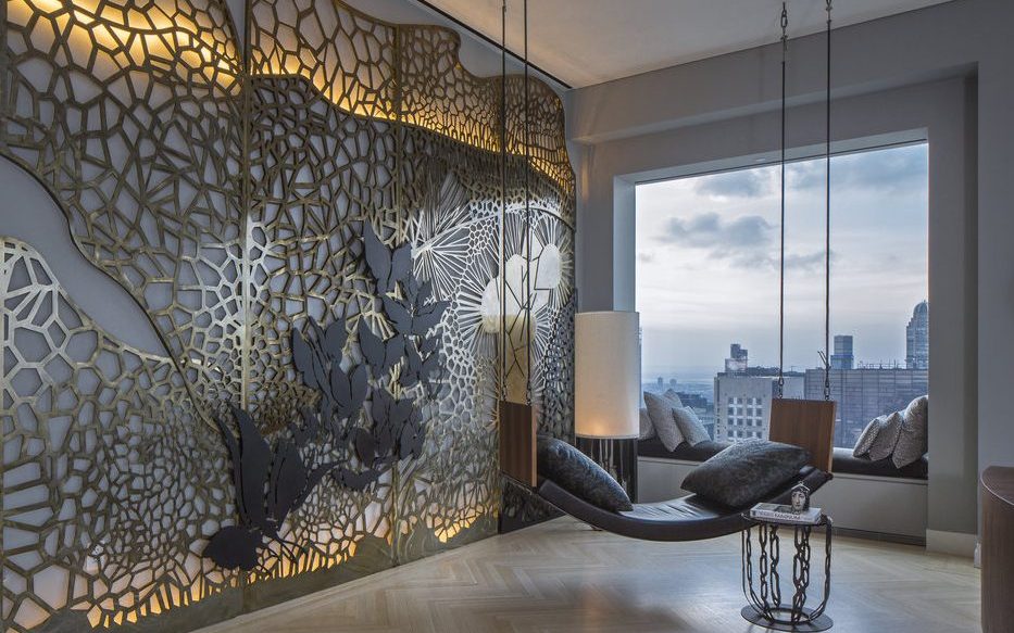 NY penthouse interior design with a metal art wall and swing by Gulla Jonsdottir - top female interior designers and architects
