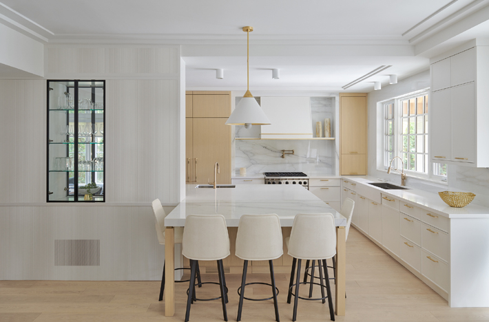 white and oak kitchen with custom built in bar design by jessica cinnamon design