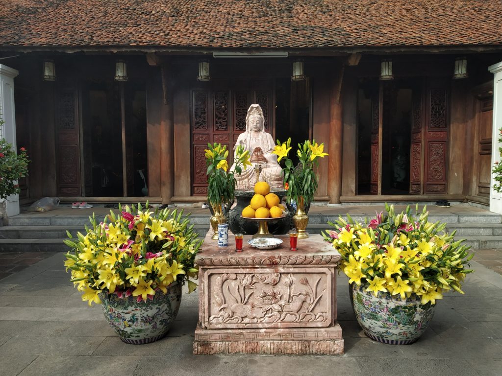 Altar with flowers in Hanoi Vietnam