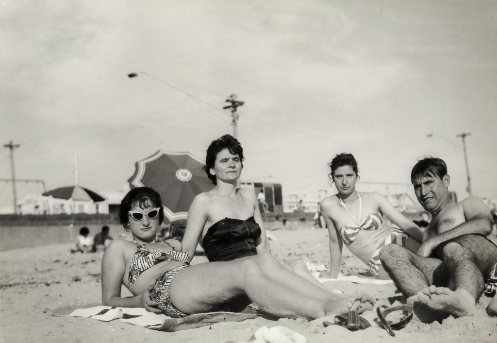 Vintage photo women and a man in swimwear and bikinis