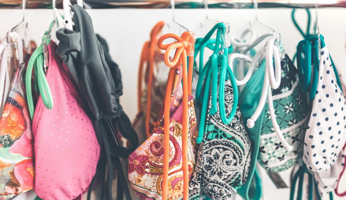 Hanging colorful bikinis by Artem Beliaikin