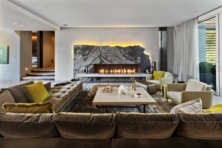 luxury living room with black quartz stone fire place bespoke custom interior design and architecture by carol  kurth