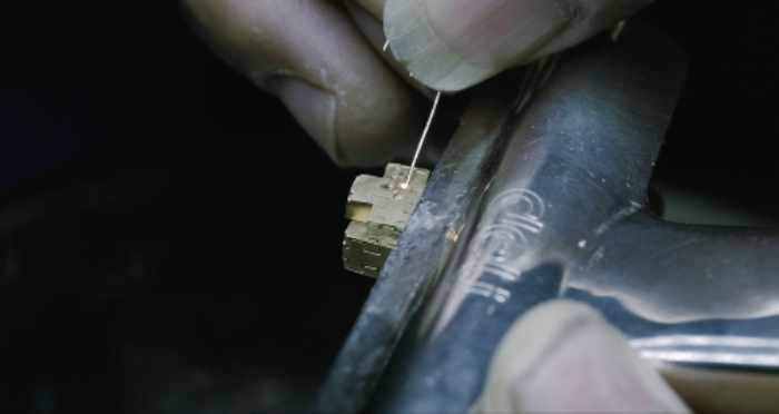 Handmaking the earrings
