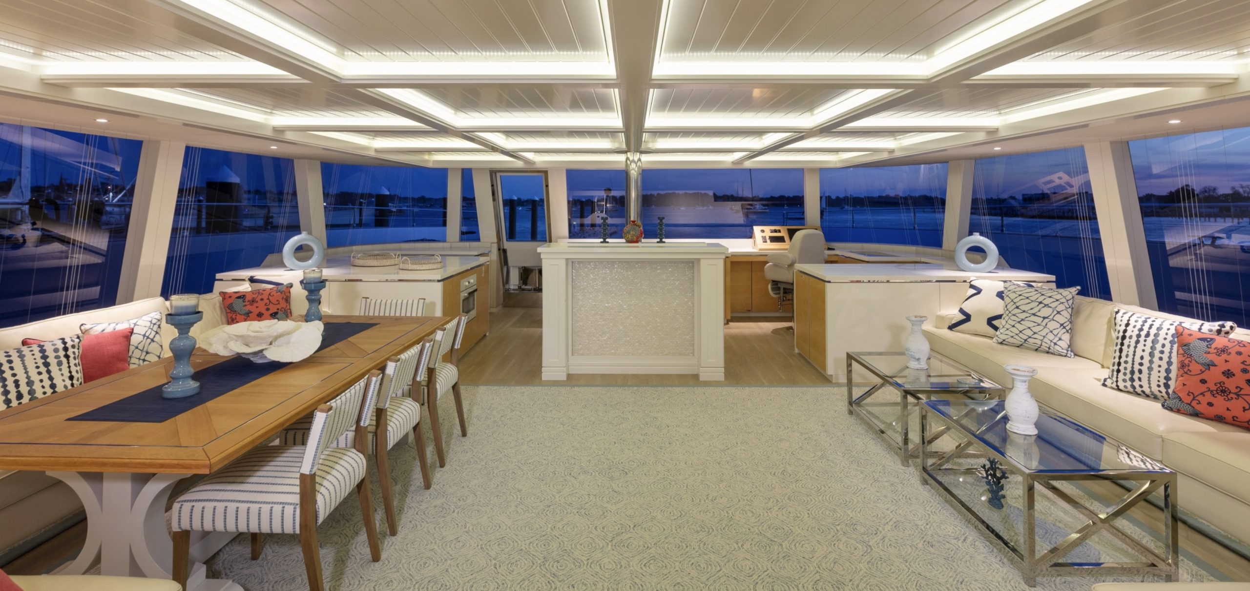 yacht interior design living room and dining room Photo by TeQoa Griffith | Courtesy of Cheryl DiGennaro