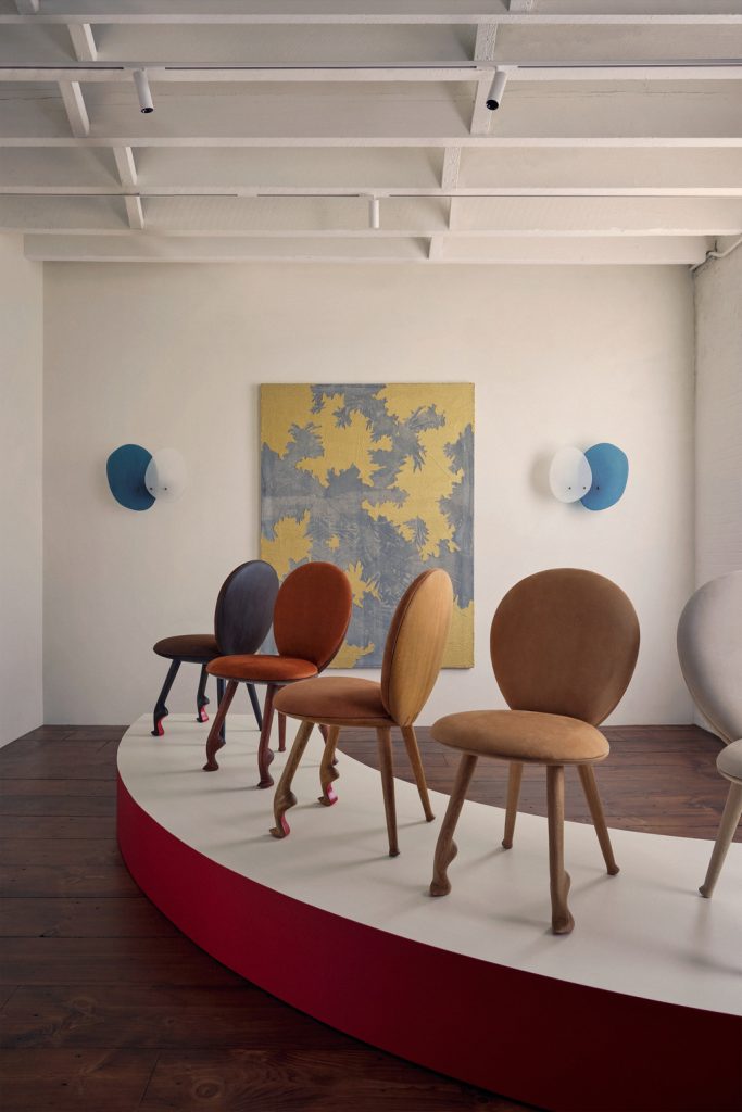 interior design and fashion collaboration clam chair nude heels