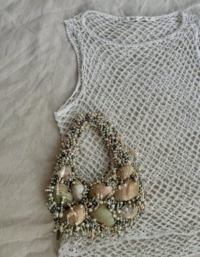 seashell handbag and netting top by Paula Votteler