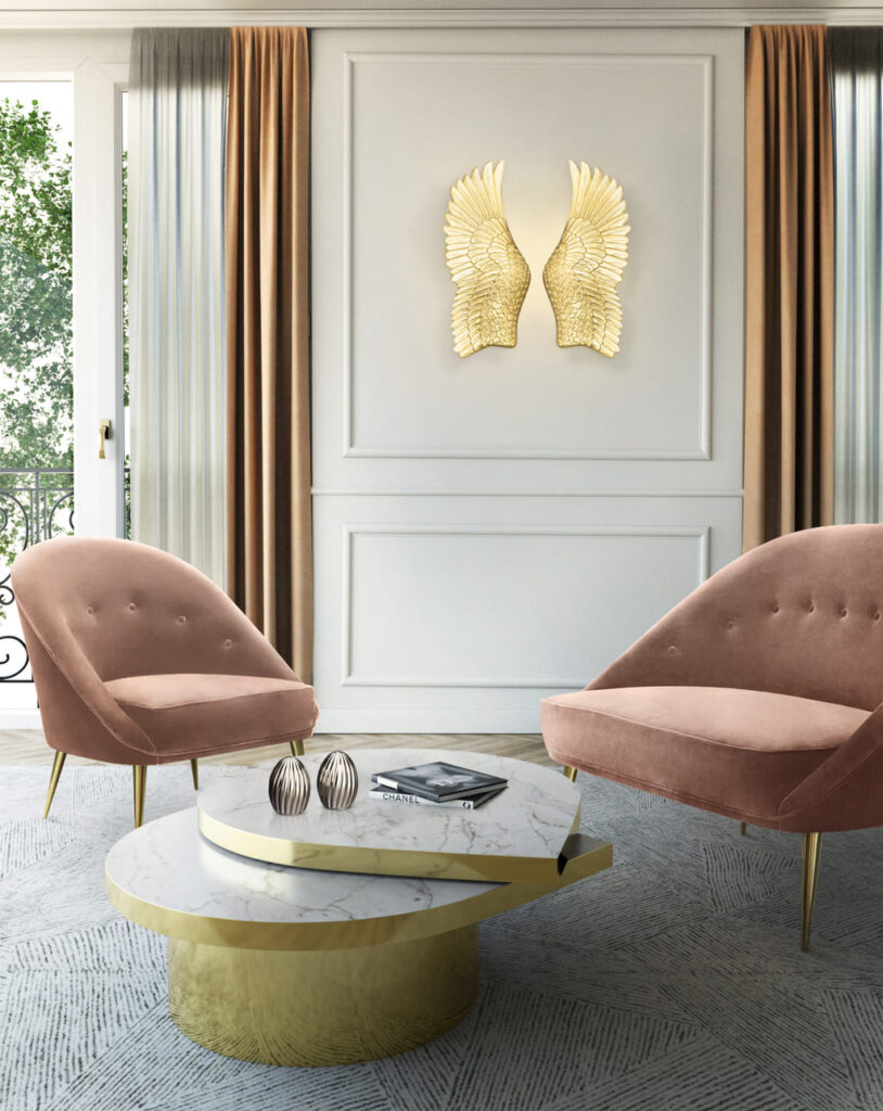 relaxation space by kk by koket nessa chairs tears coffee table gold wing shaped wood carved sconce