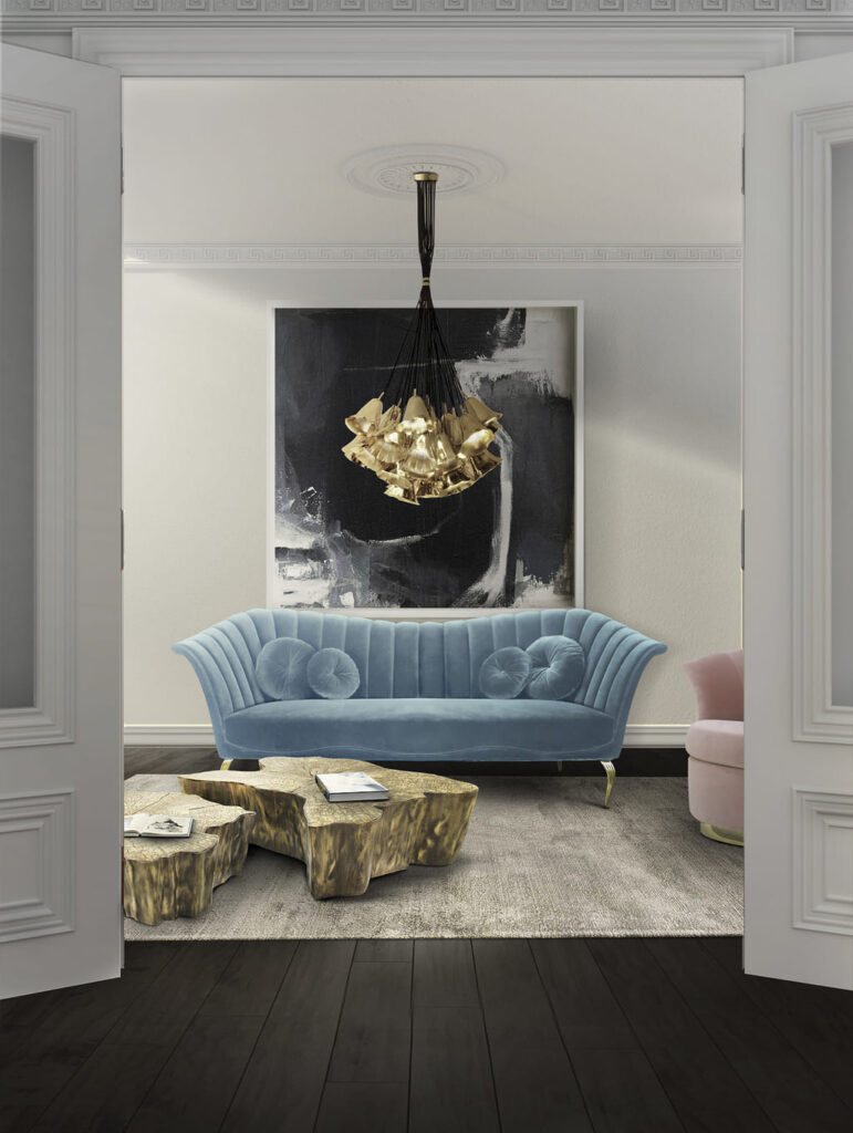 gia pendant and caprichosa sofa in blue by koket luxury relaxation space