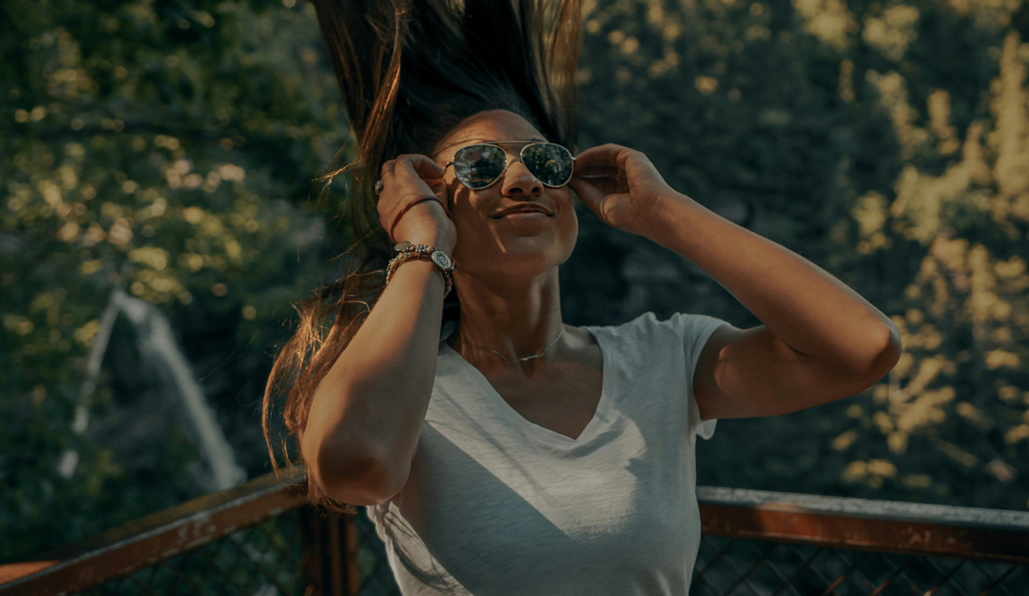 polarized sunglasses for active women - photo by Clay Banks via Unsplash