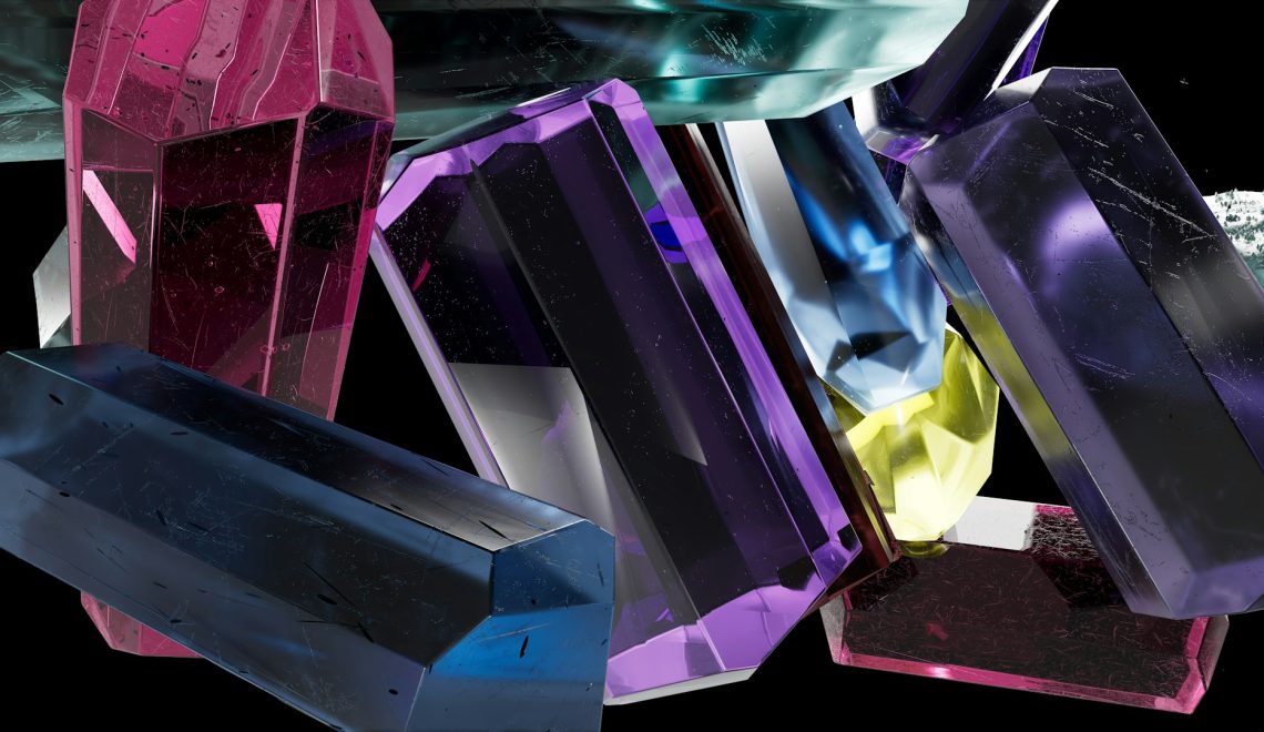 A group of different colored crystals on a black background