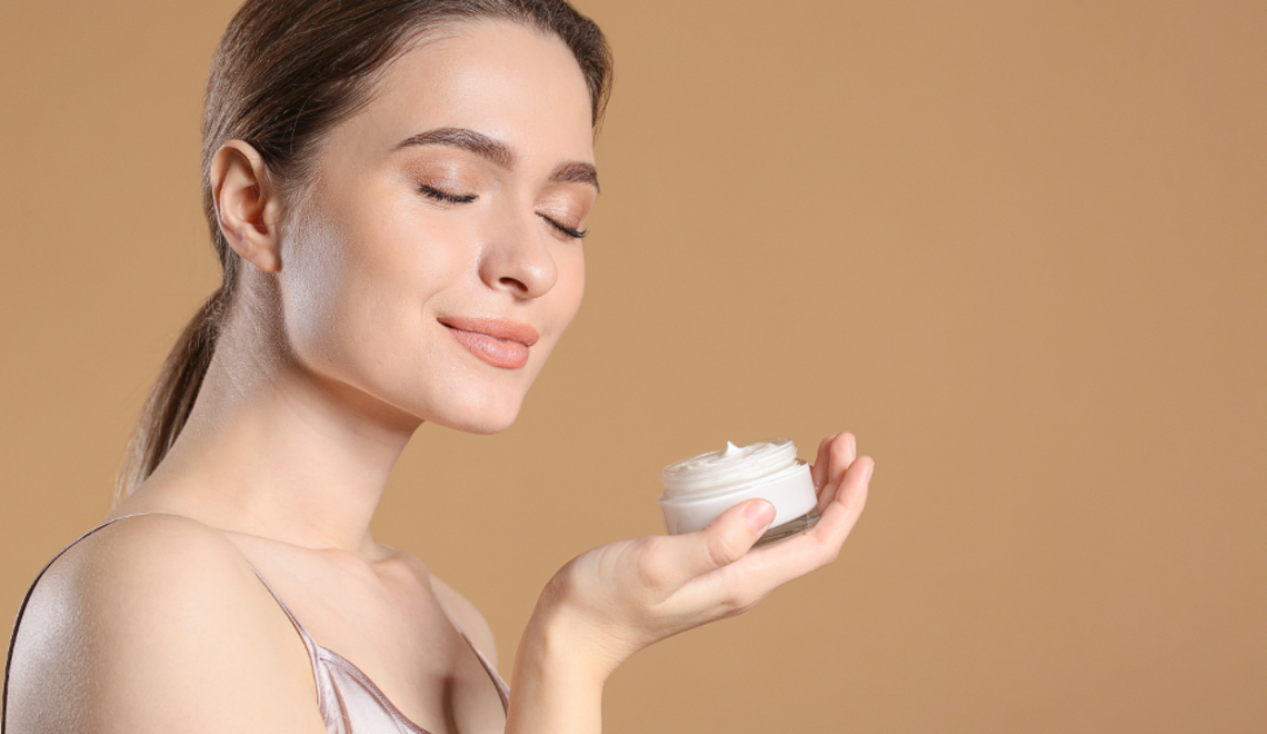 Woman holding a cream