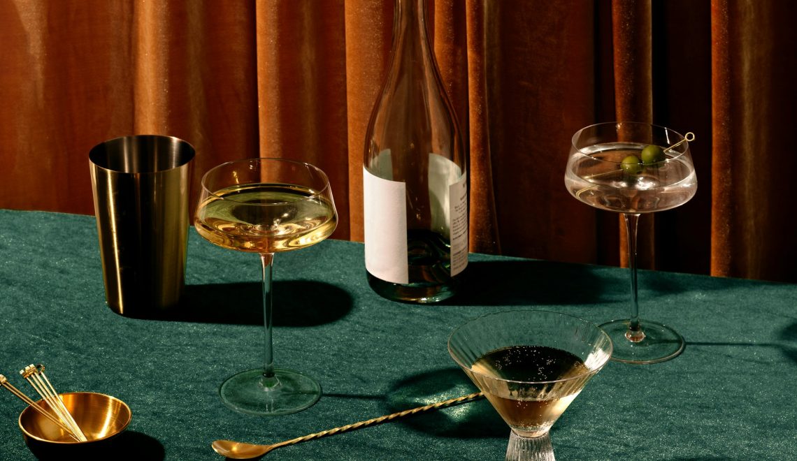 A table with glasses and a bottle
