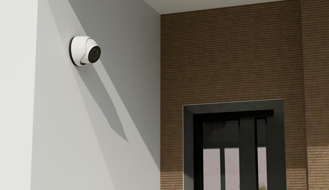 A security camera mounted on an entrance