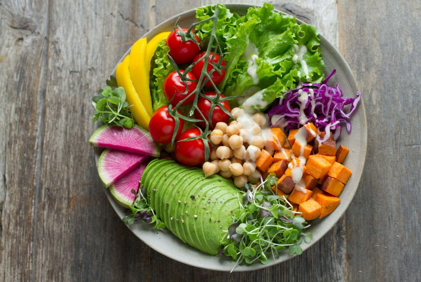 glowing skin from eating healthy plate full of veggies