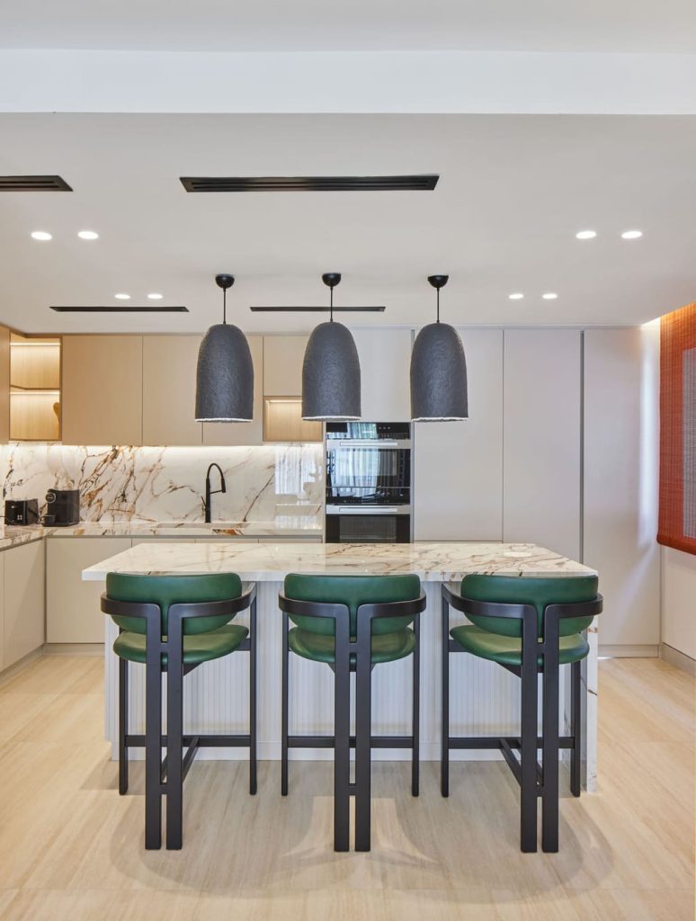 Dubai Villa design modern kitchen with green and black stools