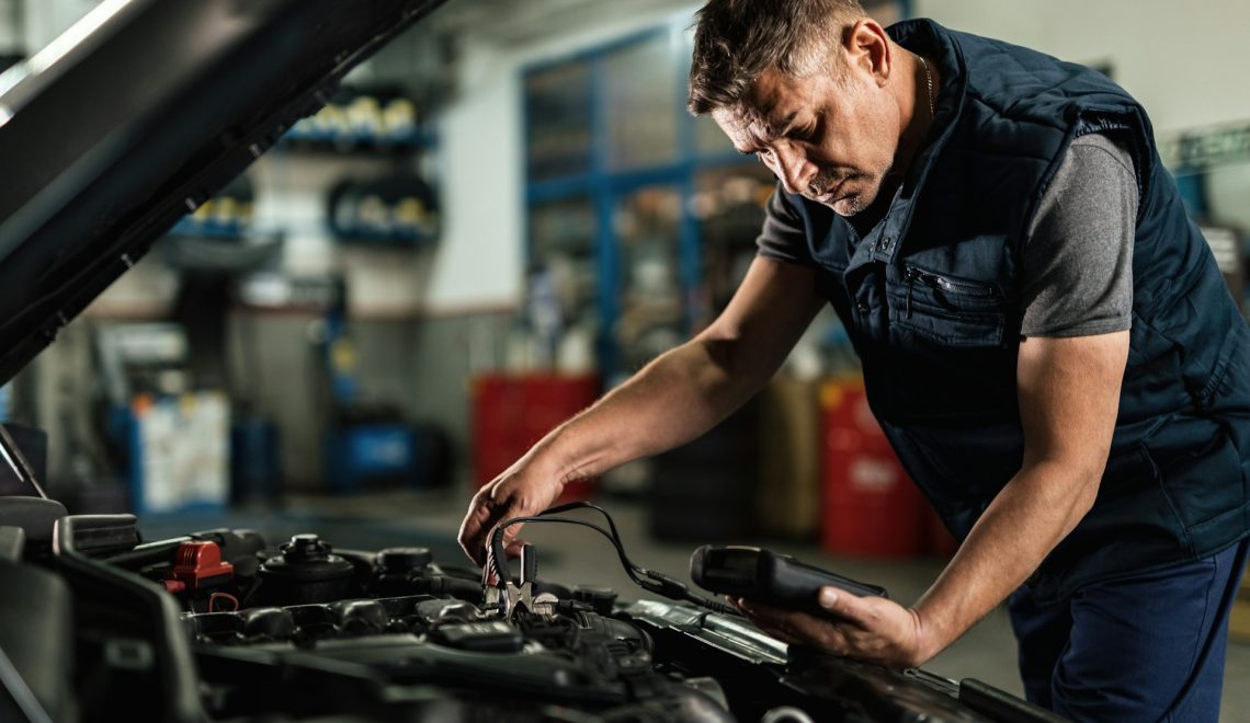 mechanic checking a car