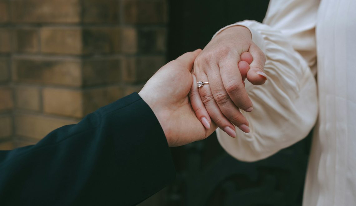 a couple holding hands