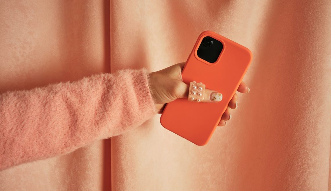 woman holding a phone