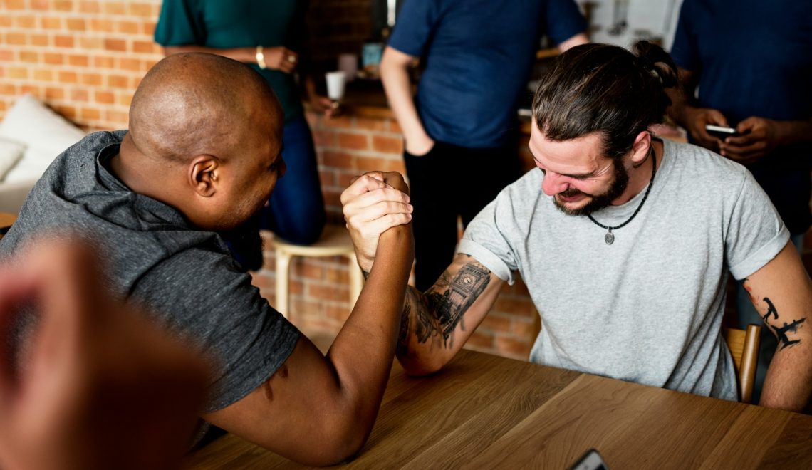 Two men arm wrestling