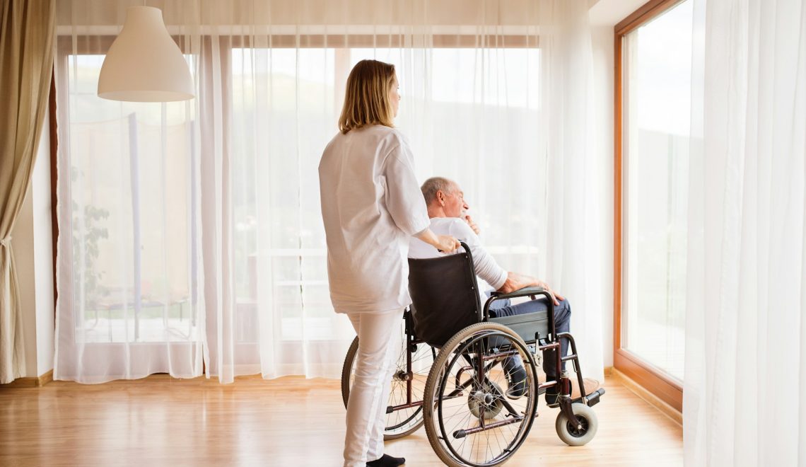 Nurse taking care of an elderly man
